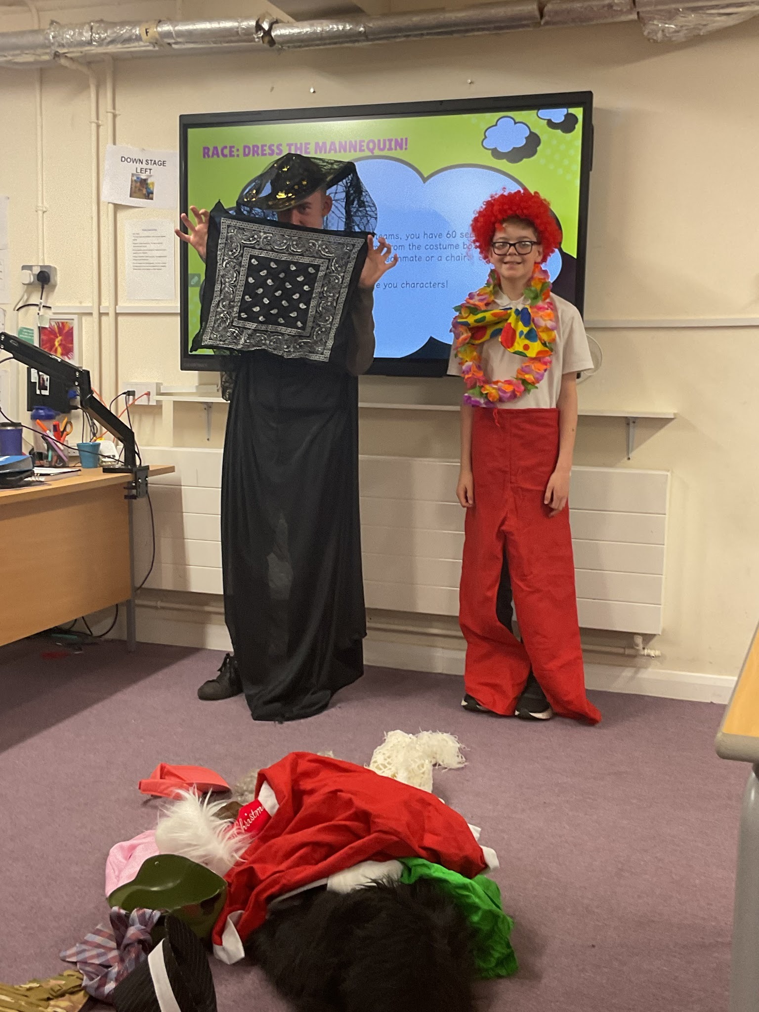 Two boys from Earth class smiling in their costumes
