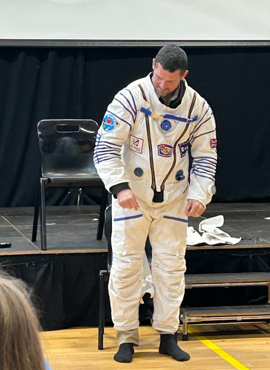 Pete getting into the astronaut suit