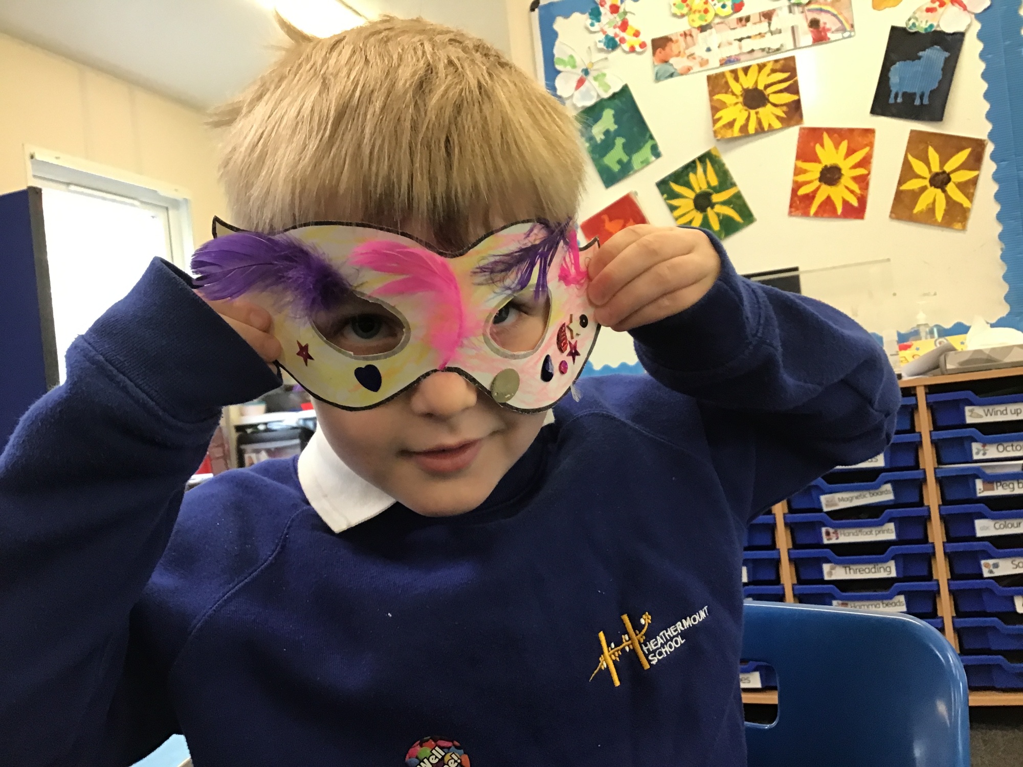 Student wearing his superhero mask