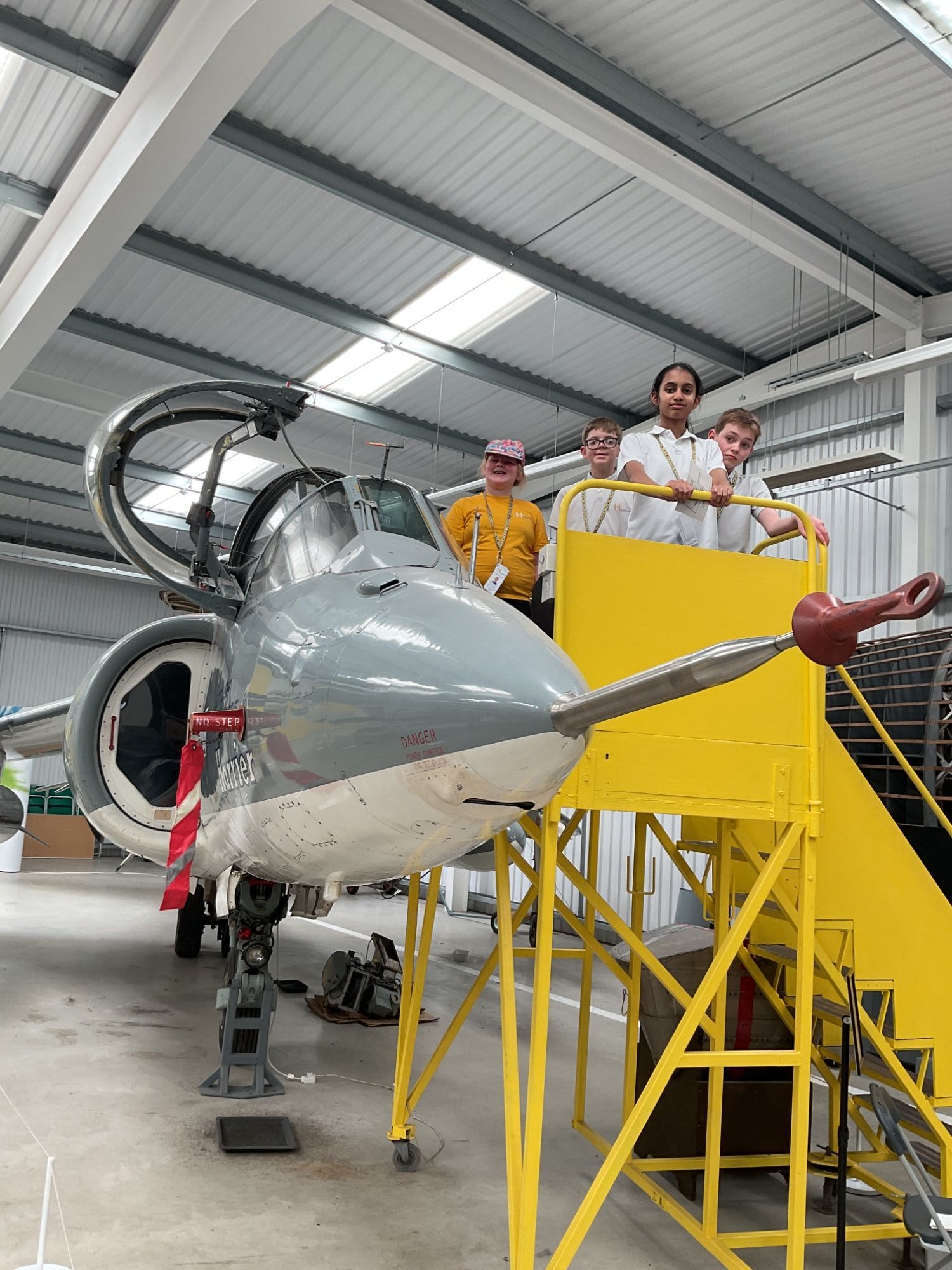 Students by fighter plane