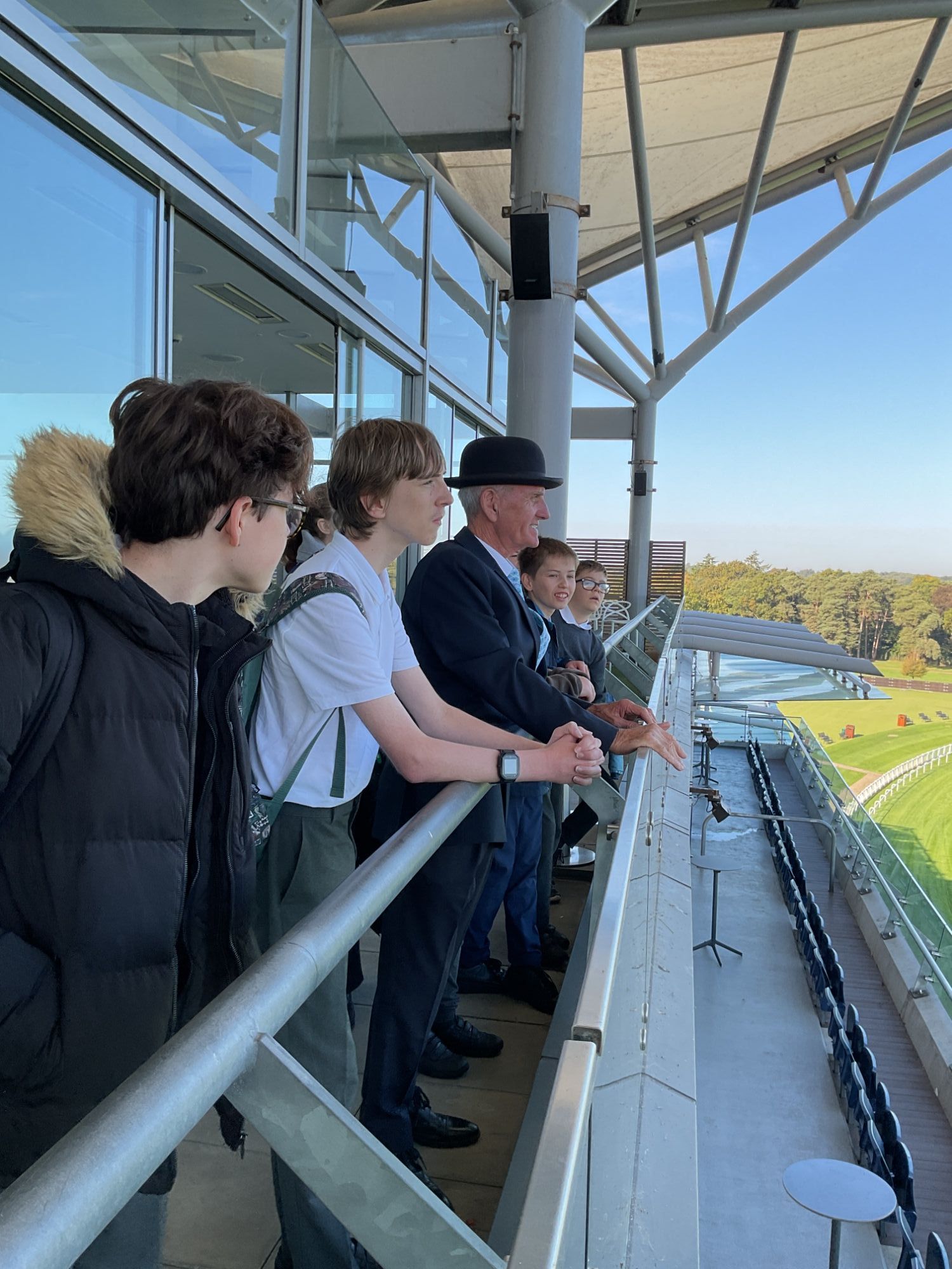 Studetns on a tour of the racecourse