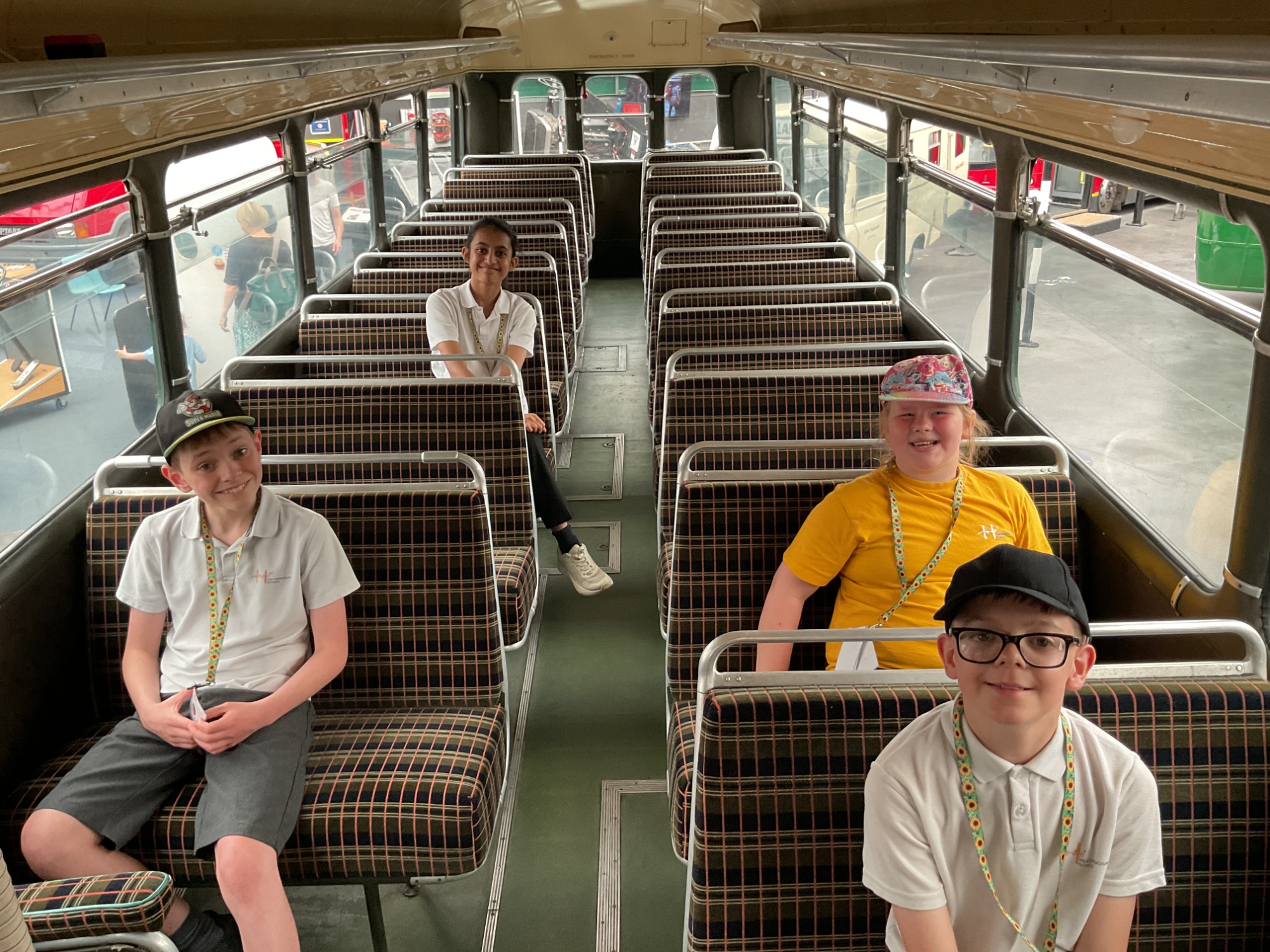 Students on top deck of bus