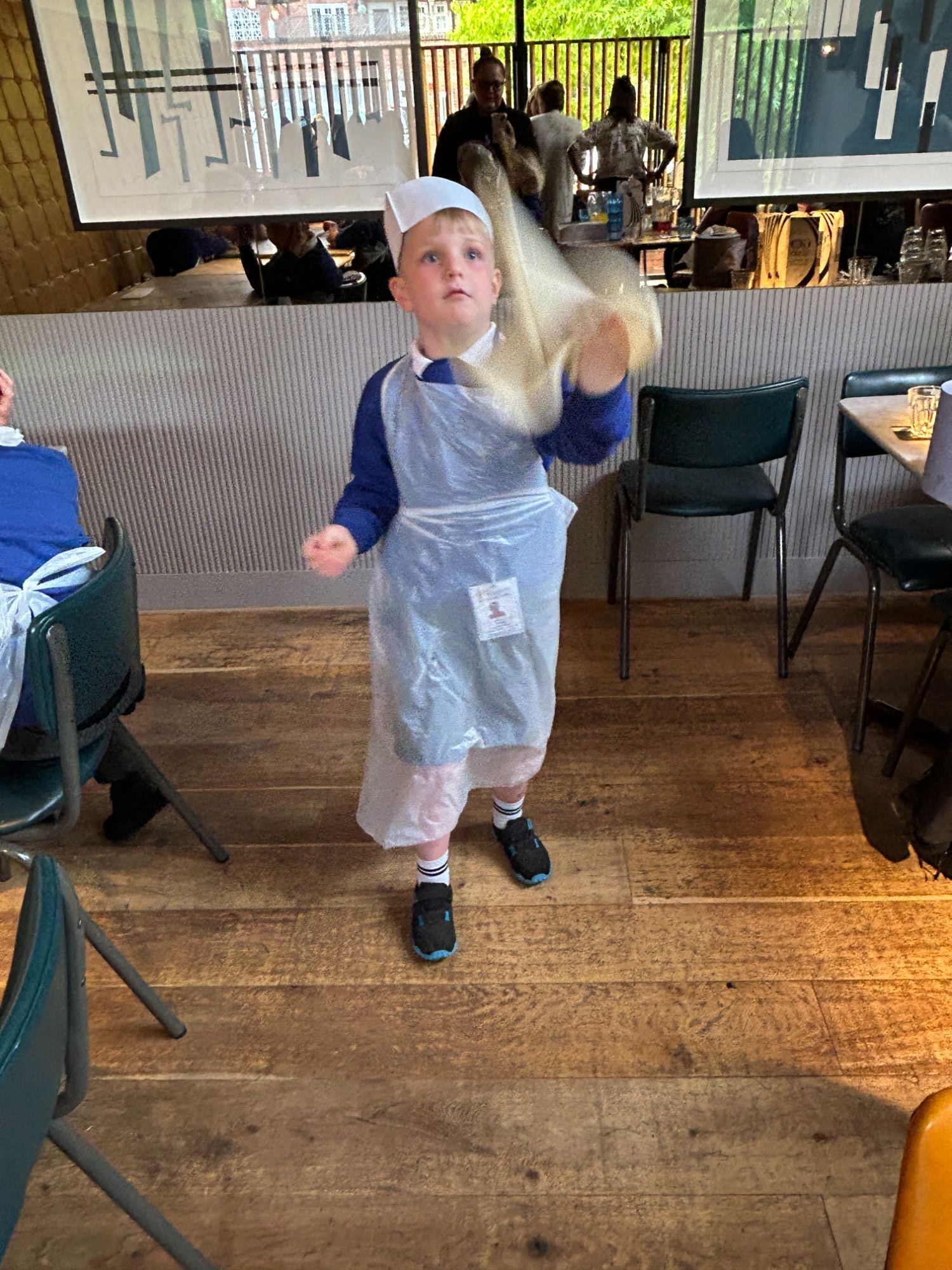 Boy pizza throwing