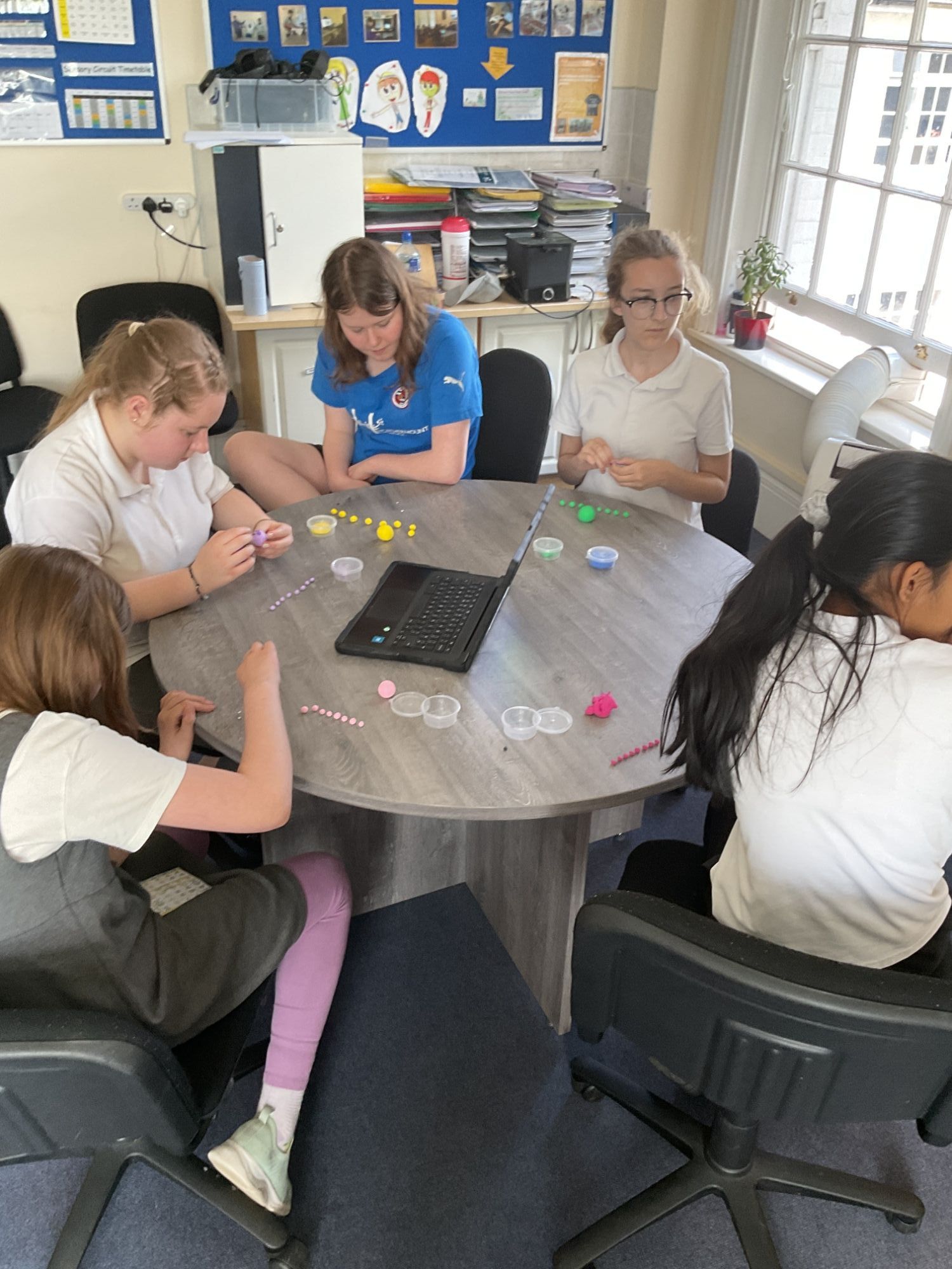 Girls Club all working on their models