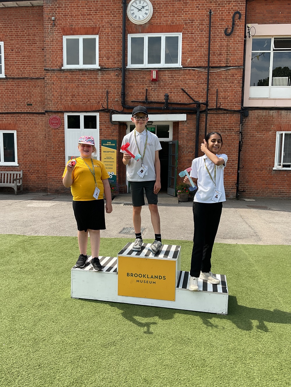 Students on awards podium for gliders