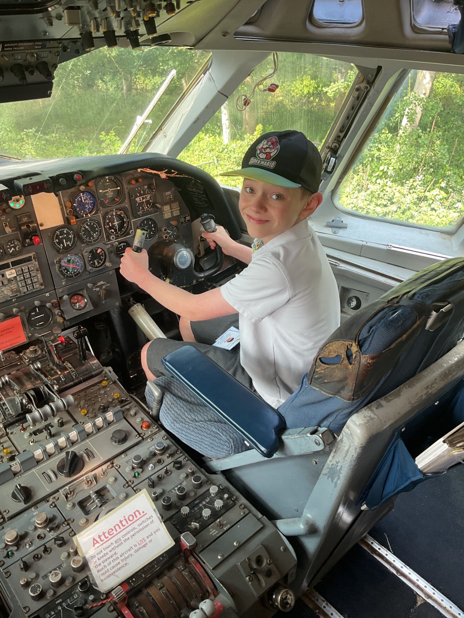 Student in aeroplane cockpit