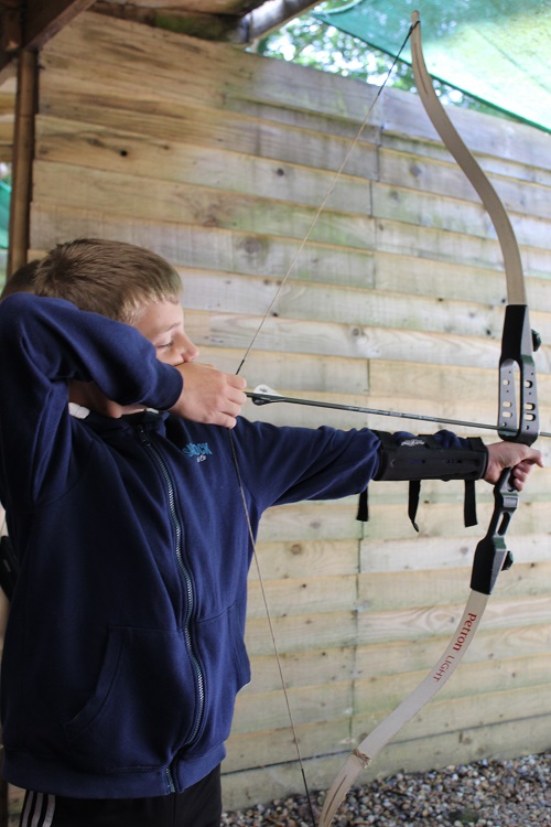 Student doing archery