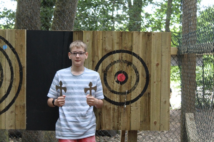 Students by the axe throwing targets