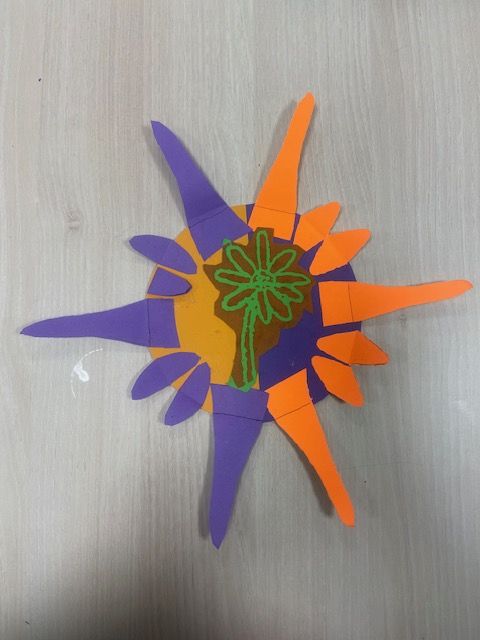 One half purple petals and one half orange