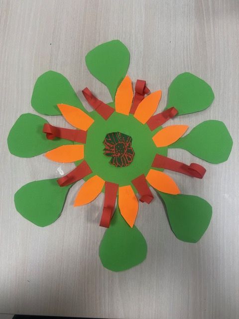 Green and organge petals on brown stems