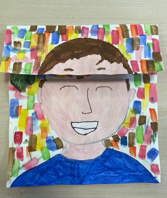 Brighltly coloured self portrait of a boy with brown hair.