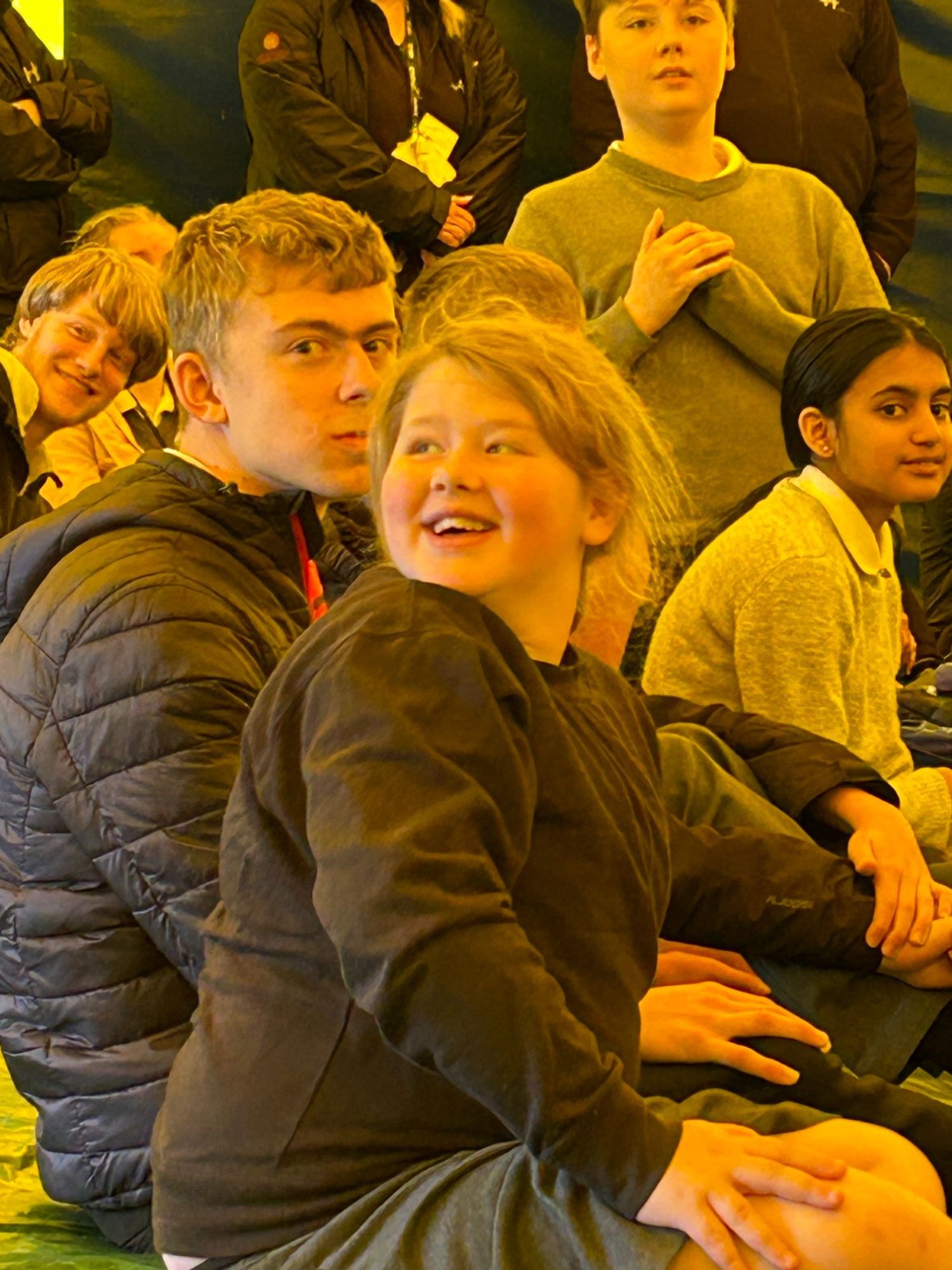 Students laughing watching the schow