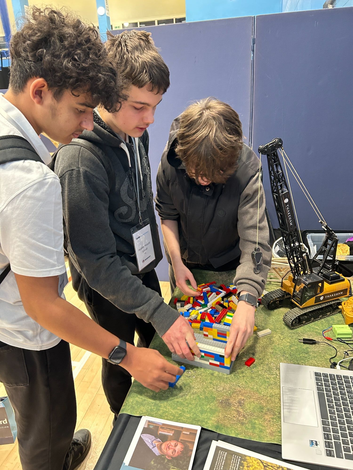 Students working together on a stall