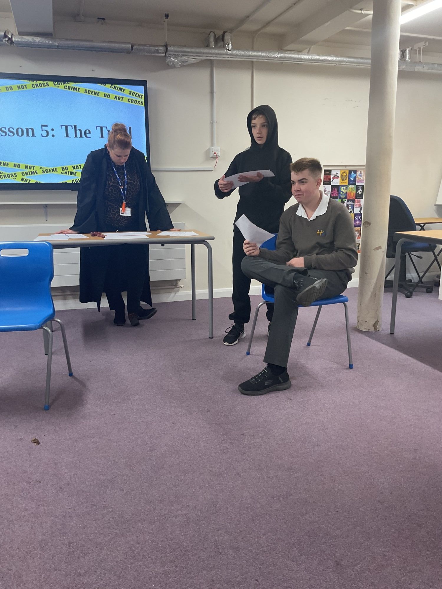 Boys from Mercury acting out a trial with their teacher 2