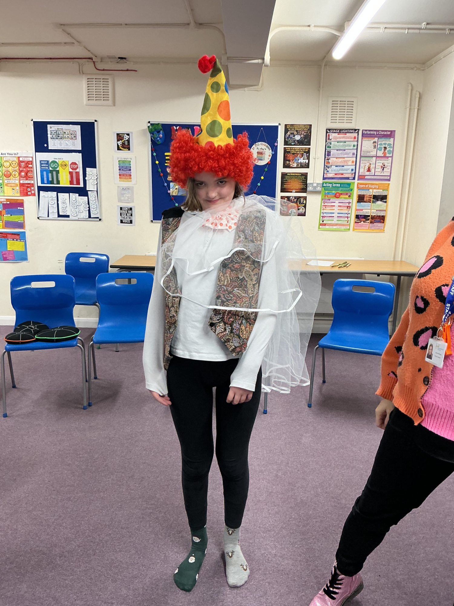 Girl from Elm wearing a clown hat