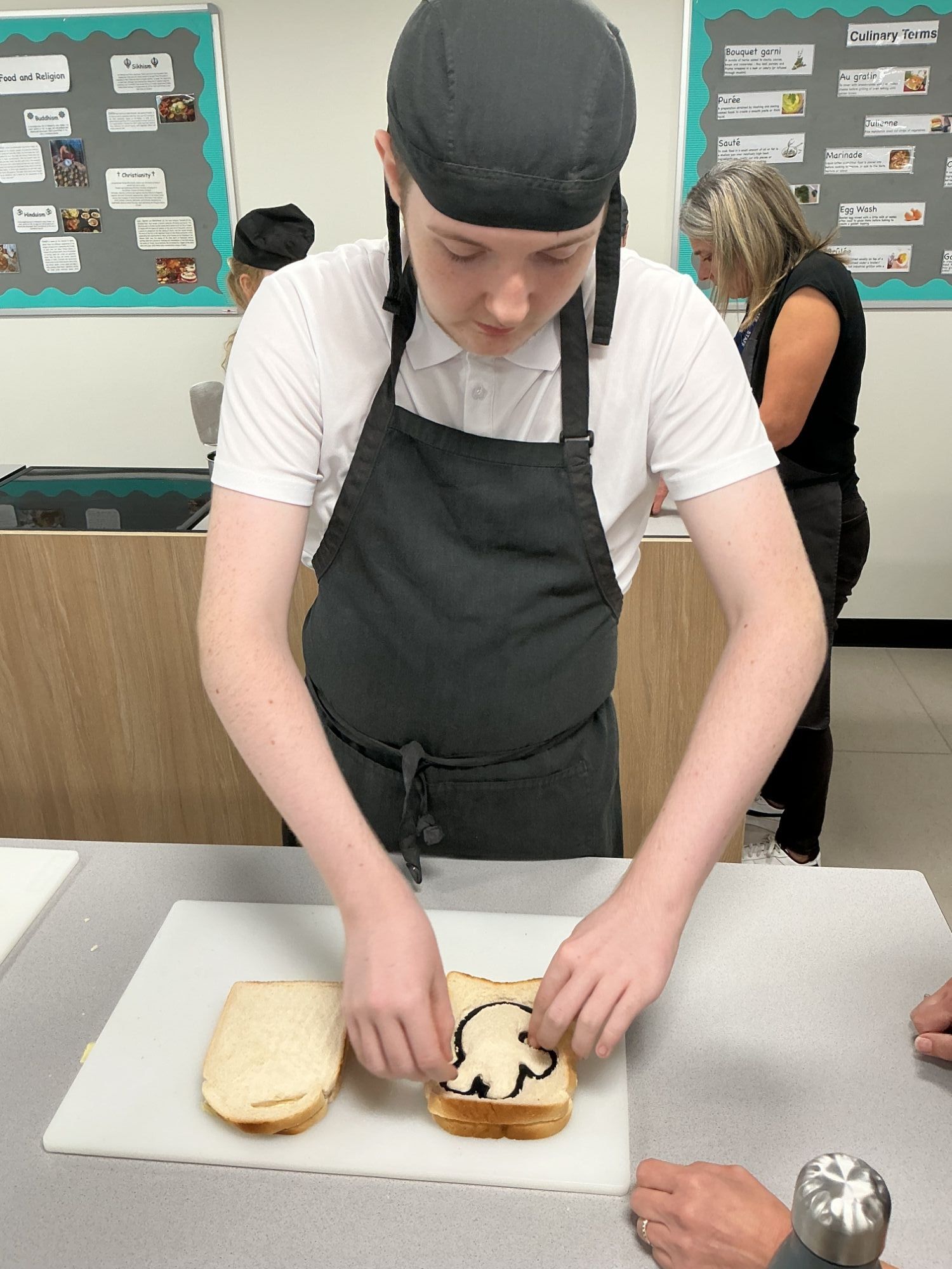 Student decorating party food