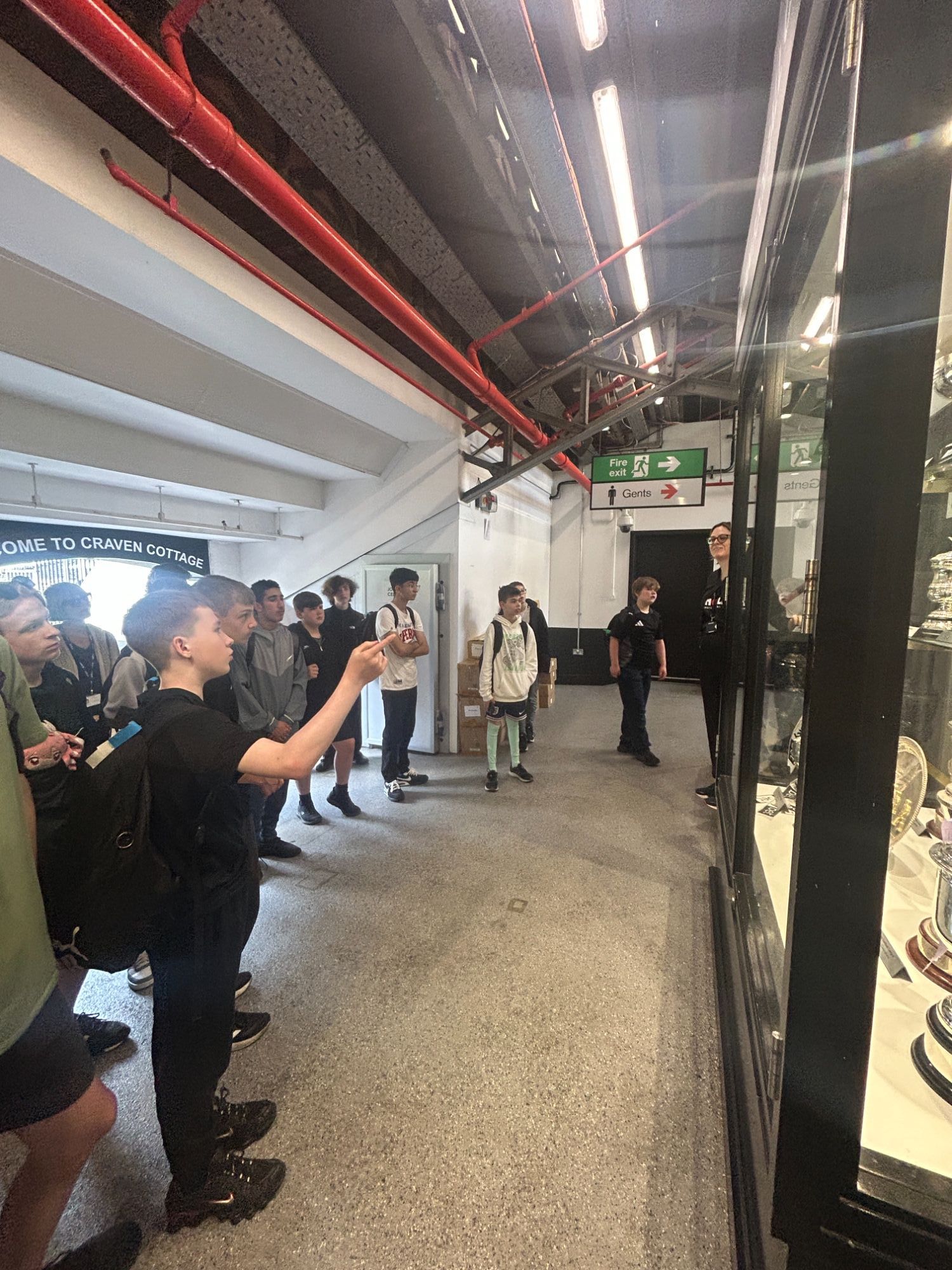 Students looking at the trophy cabinet