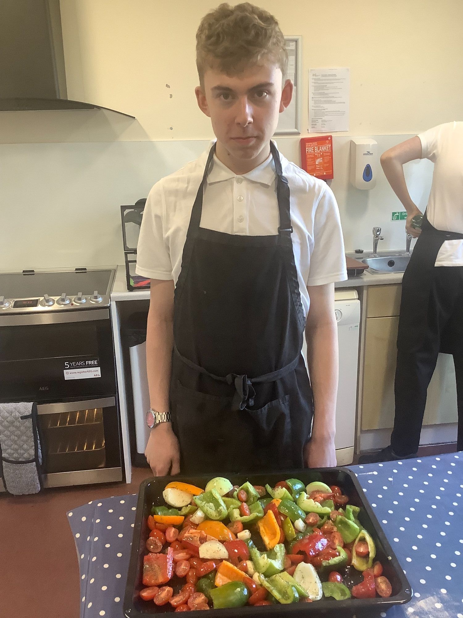 Student with his chopped peppers