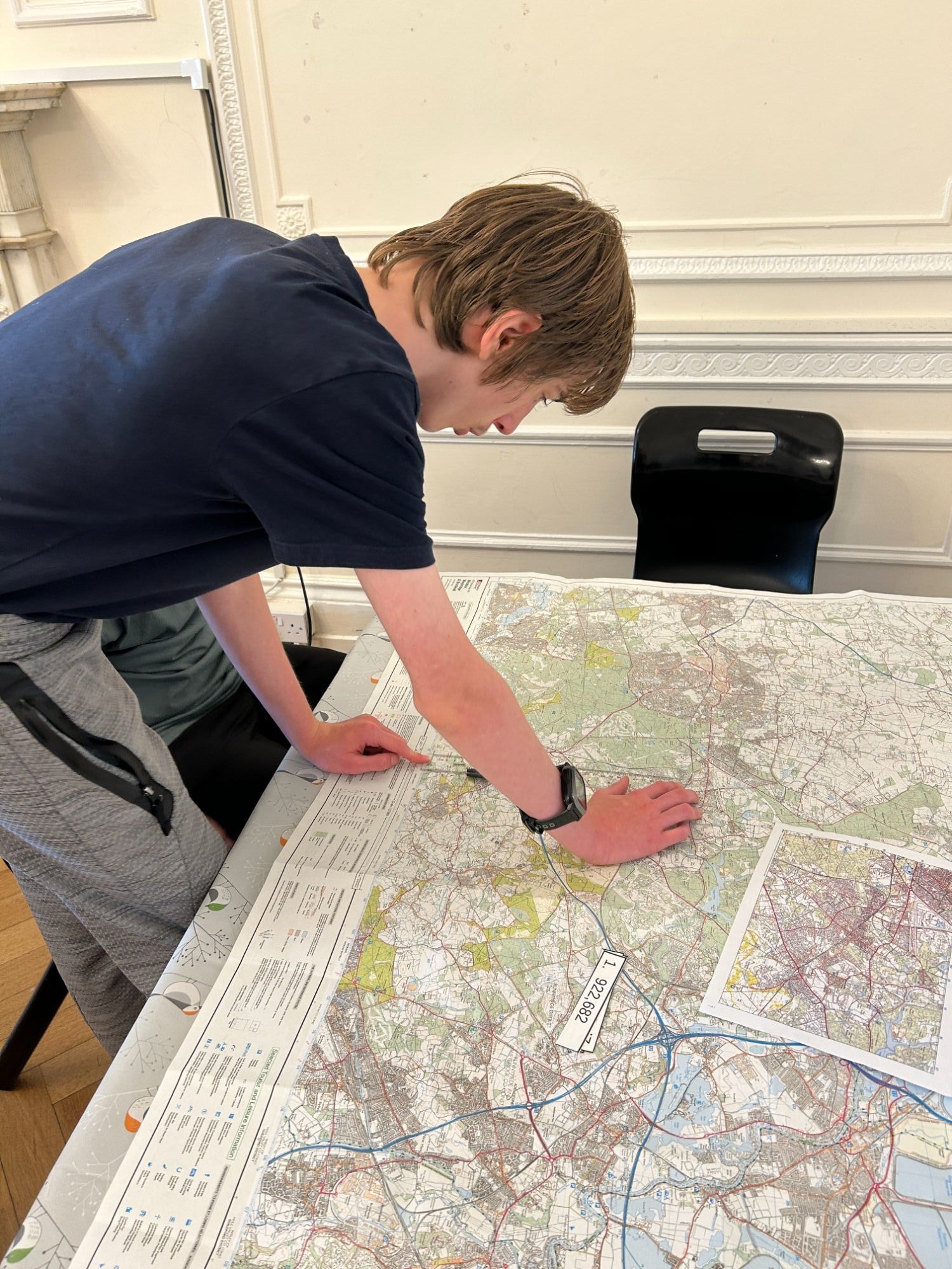 Student studying map
