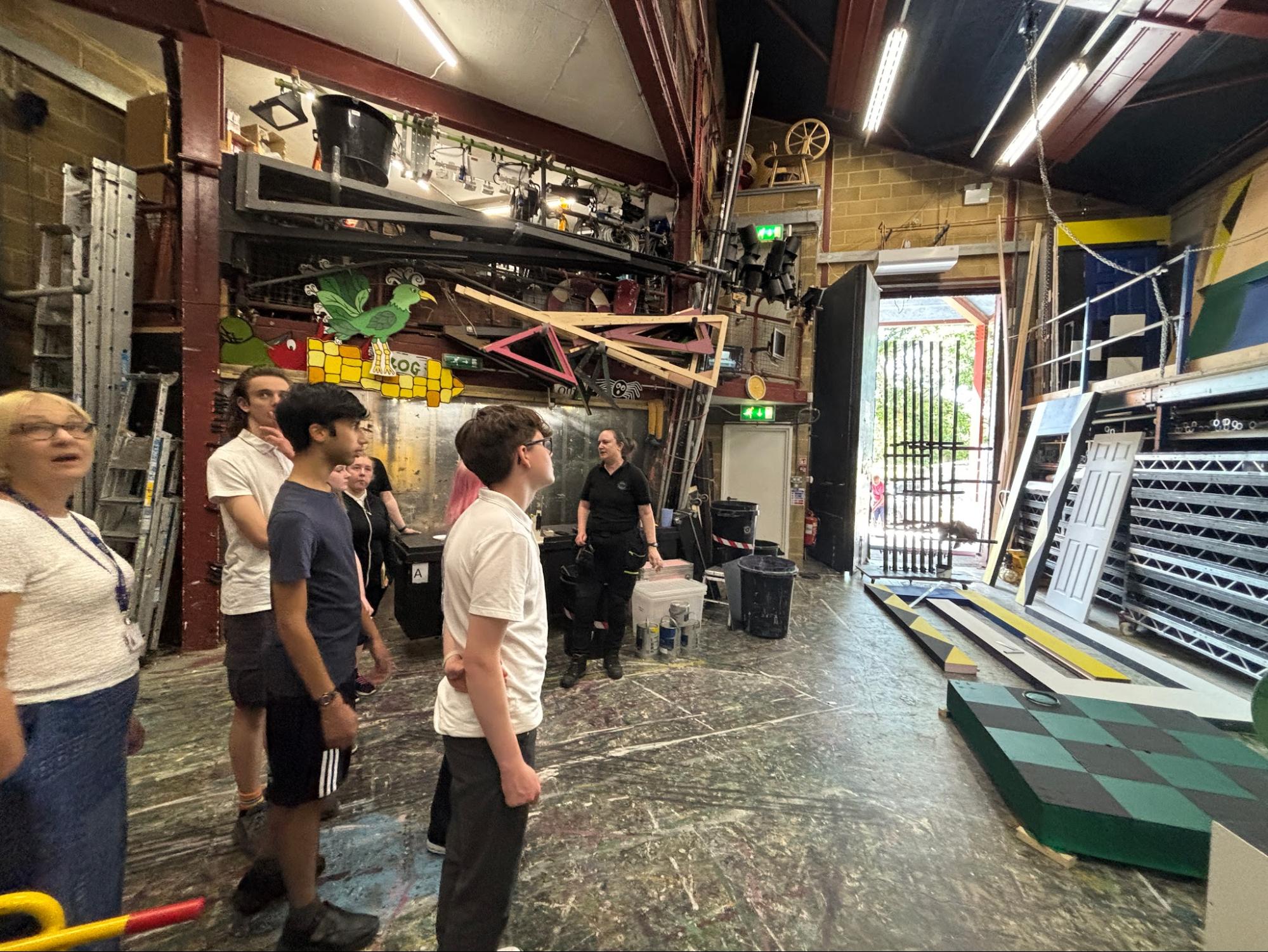 Students on a backstage tour of South Hill Park