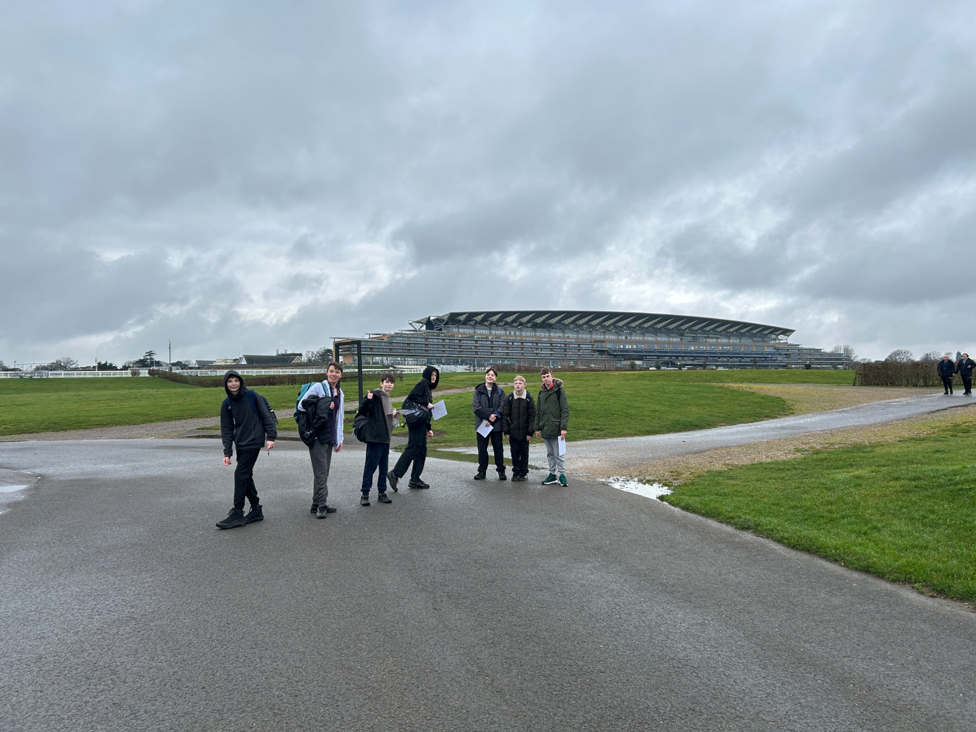 Students on their DofE walk with the race course in the background