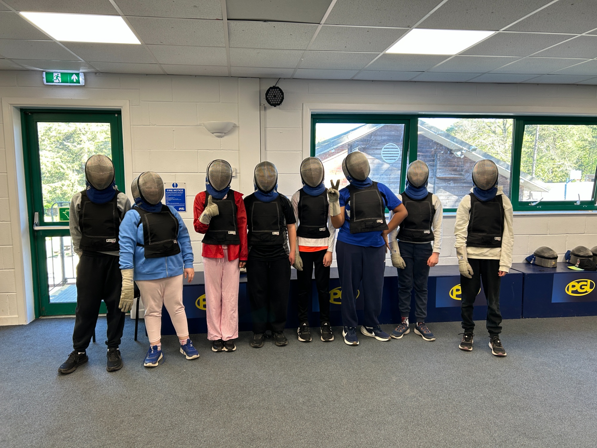 Students all lined up and ready to try fencing