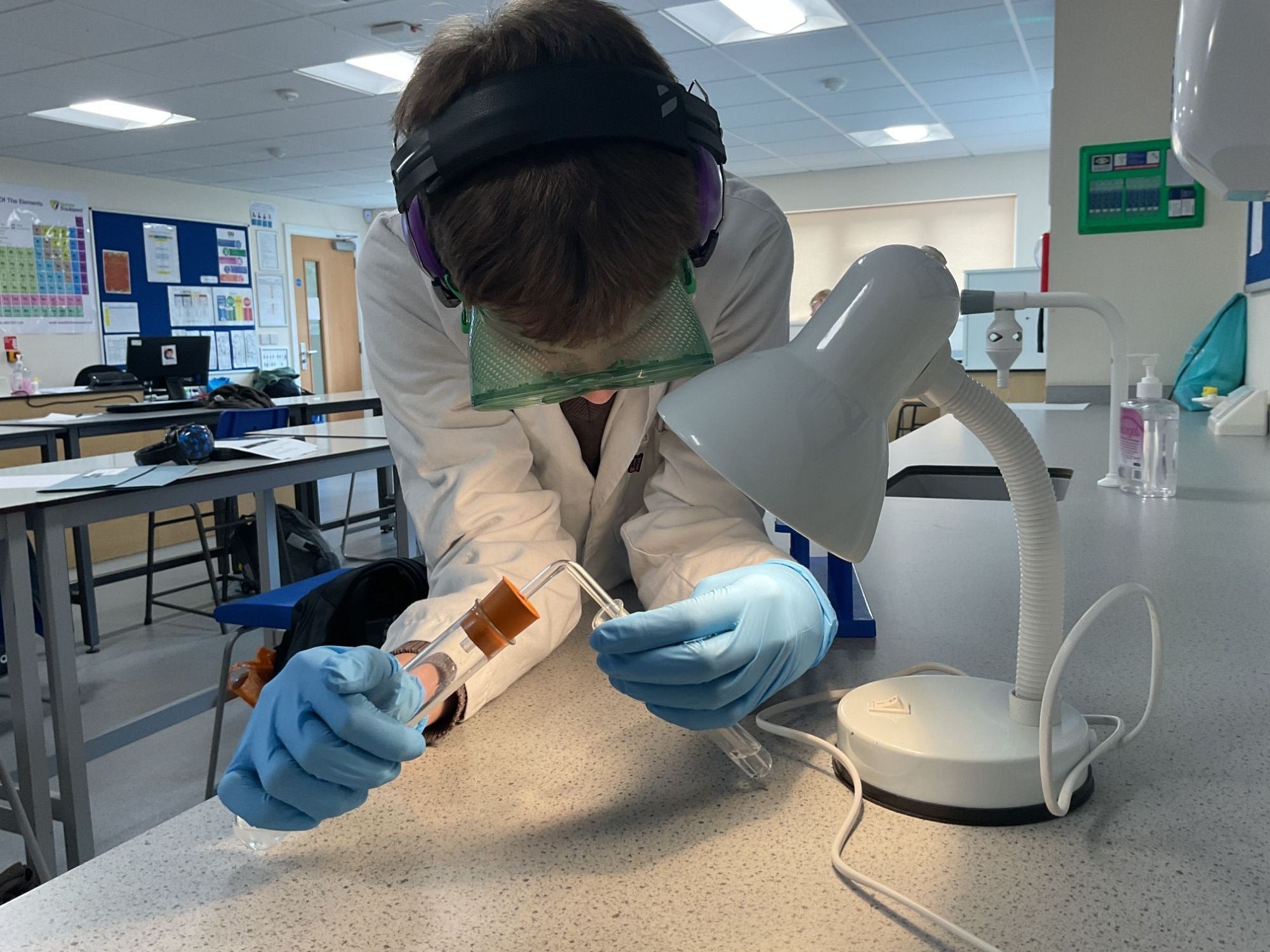 Student from Saturn working hard on their experiment