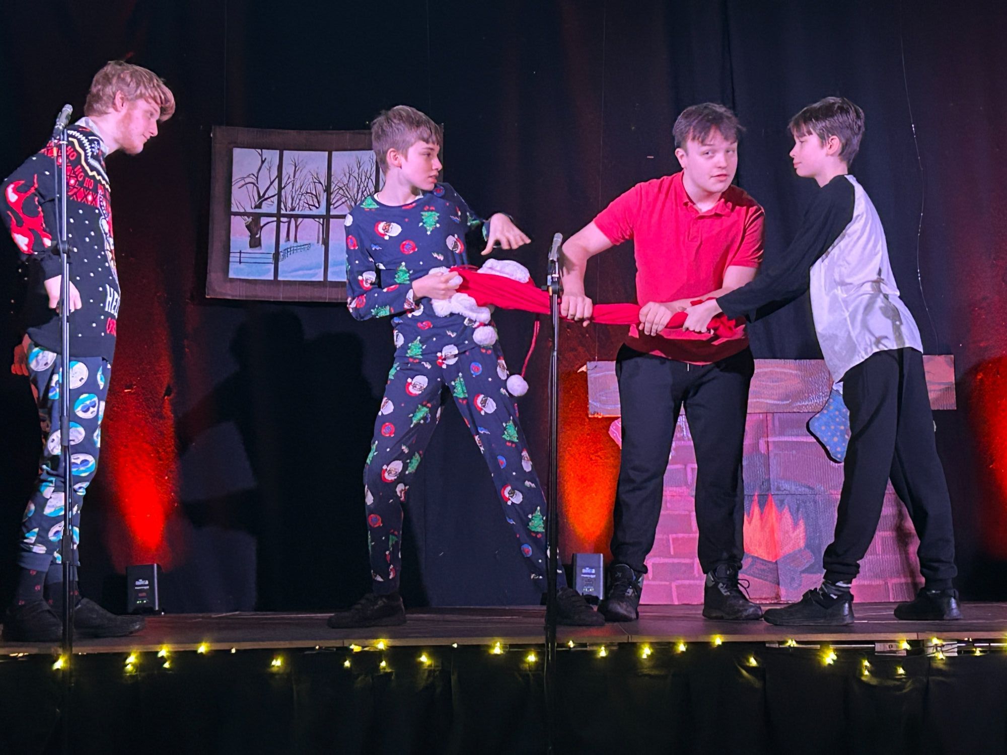 Students act out a squabble over a present