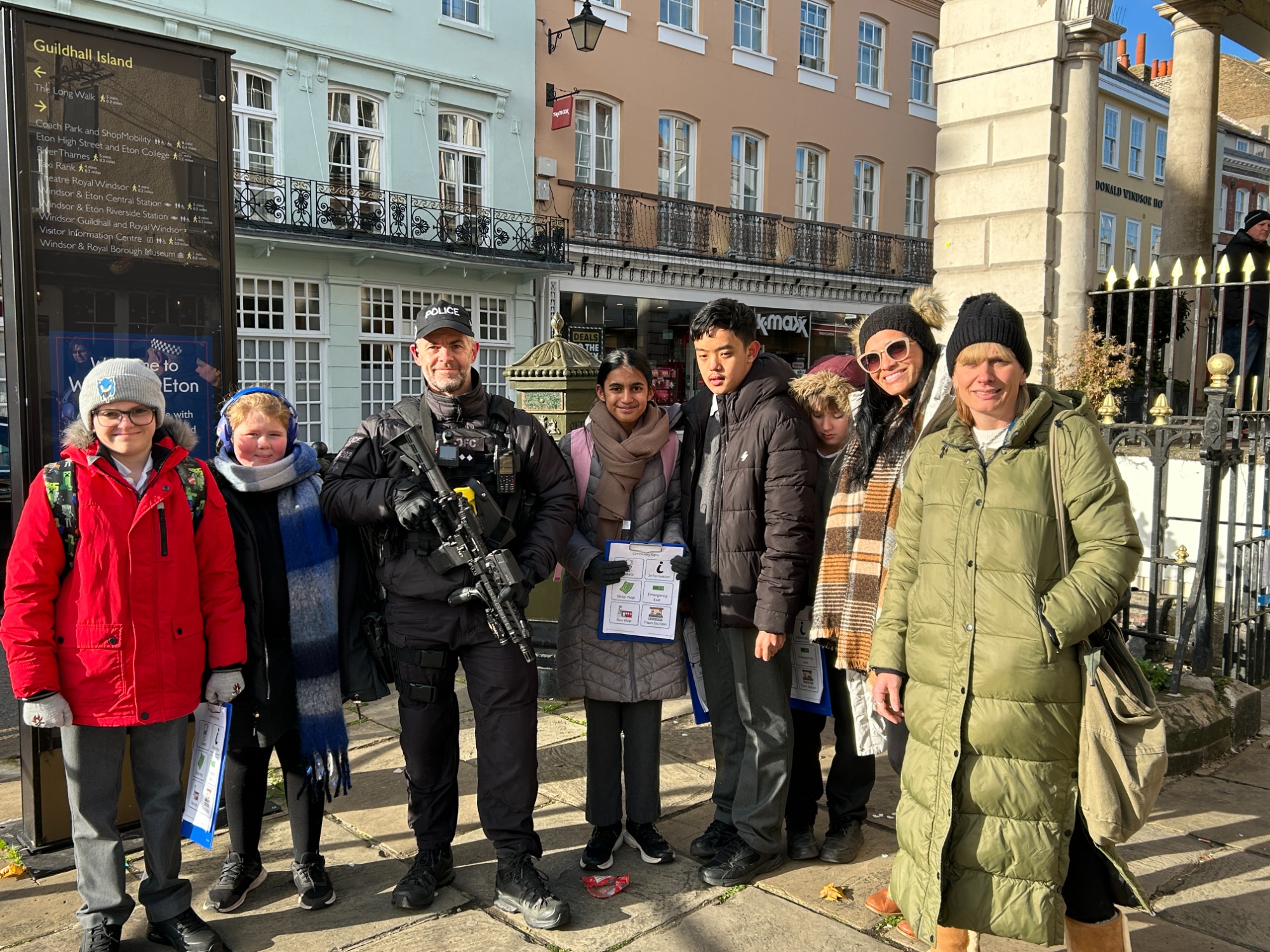 Earth Class with a police officer