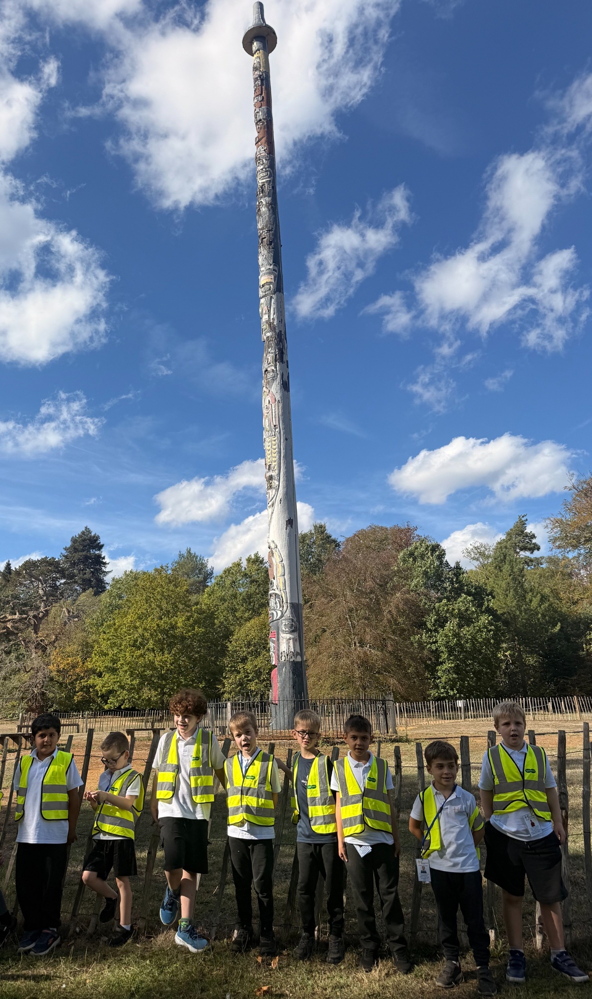 Totum Pole All the children stood in front on a totem pole
