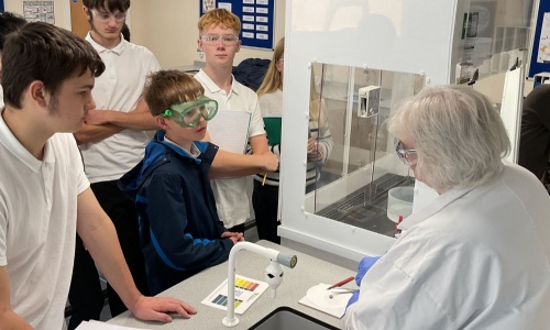 GCSE Science students watch an experiment