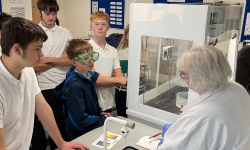 GCSE Science students watch an experiment