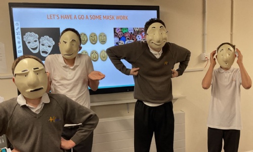 Earth Class acting with masks on