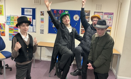 Students from Saturn and Neptune class rehearsing for the musical where they will appear as part of a gang.