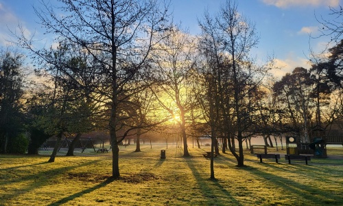 The sun rising over the grounds at Heathermount
